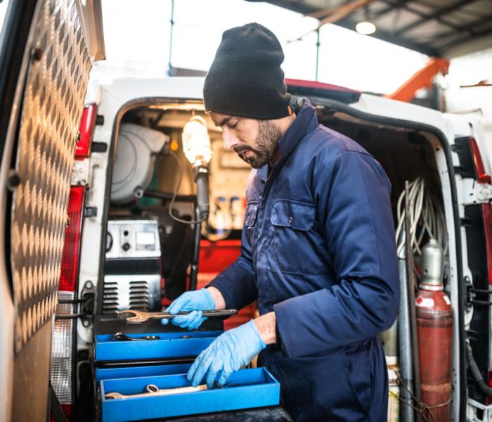 The Think global worker checking the tool kit at Burnaby, BC